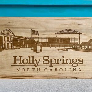 engraved Holly Springs skyline on wood block