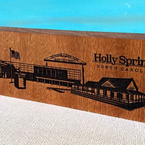 engraved Holly Springs skyline on wood