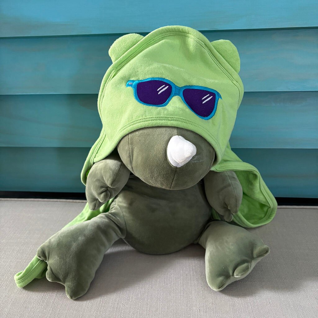 dino in a bear towel